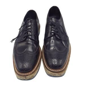 Prada Black Leather Wingtip Platform Shoes Size 38.5 Authenticated